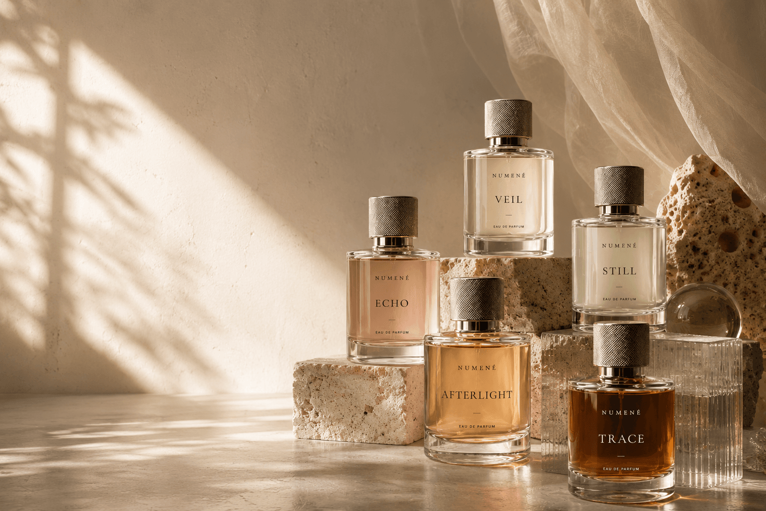 Numené fragrance collection in warm architectural light